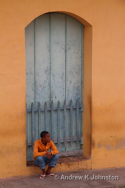 1110_7D_3822.jpg - Youth in doorway, Trinidad